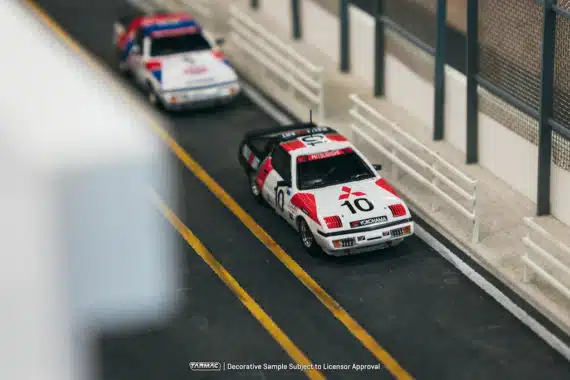 Tarmac Works 1/64 HOBBY64 Mitsubishi Starion, Macau Guia Race 1985, Michael Lieu