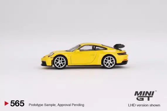 MINI GT No.565 Porsche 911 (992) GT3 Racing Yellow MGT00565