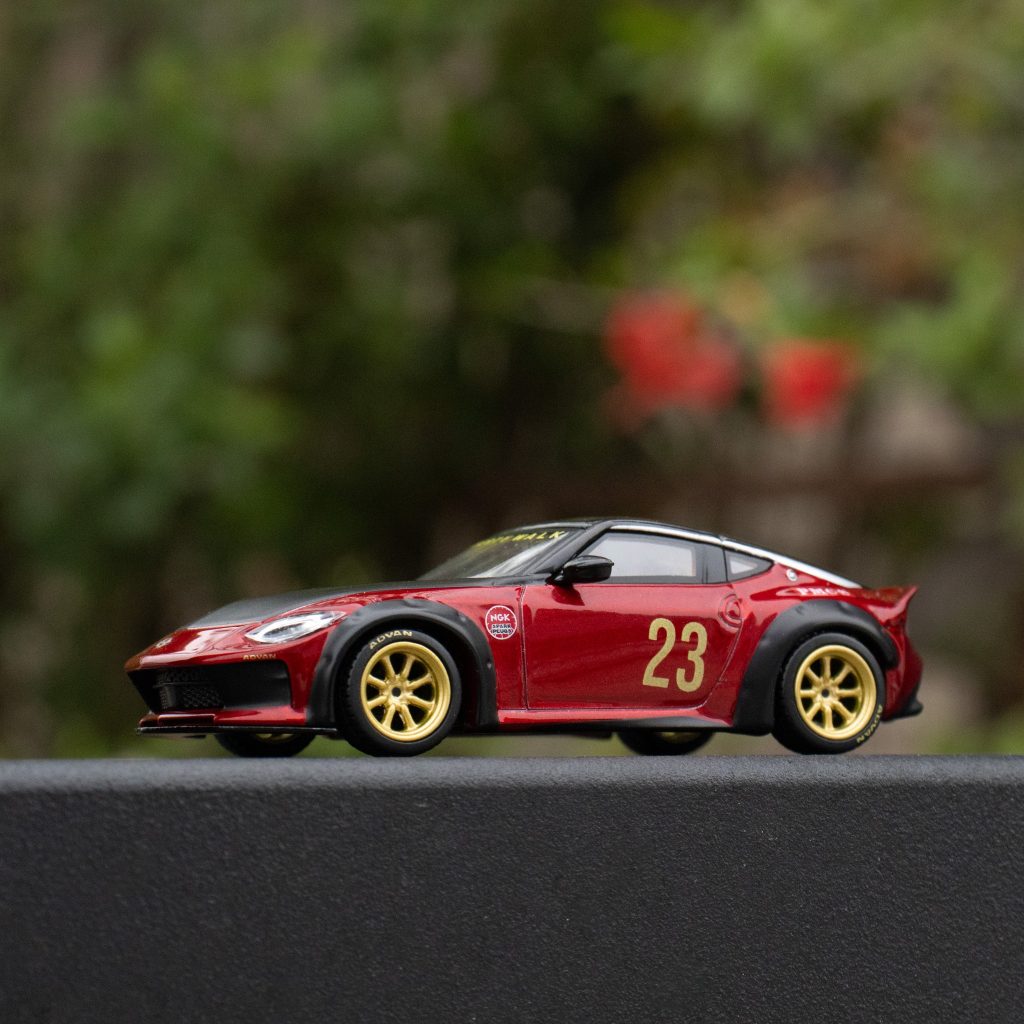 MINI GT No.737 CLDC BOOK with interview MINIGT bundle with 1:64 MINI GT Nissan Z LB Nation Works Gem Red MGT00737