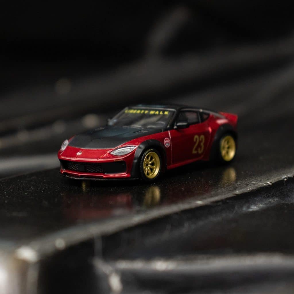 MINI GT No.737 CLDC BOOK with interview MINIGT bundle with 1:64 MINI GT Nissan Z LB Nation Works Gem Red MGT00737